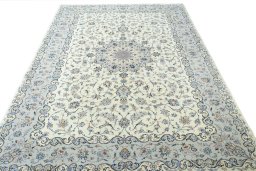 Surface texture of New Kashan rug with natural Wool and intricate pattern