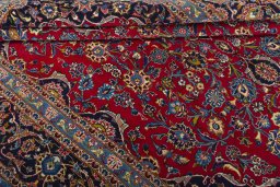 Close-up detail of 2000s Kashan rug from Iran / Persia showing Wool weave