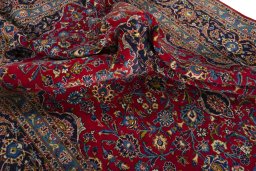 Surface texture of 2000s Kashan rug with natural Wool and intricate pattern