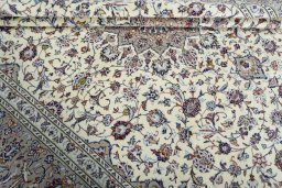Close-up detail of 2000s Kashan rug from Iran / Persia showing Wool weave