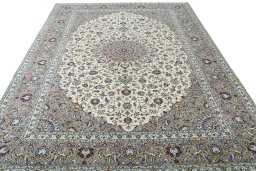 Surface texture of 2000s Kashan rug with natural Wool and intricate pattern