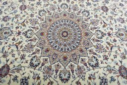 Central medallion detail of 2000s Kashan rug from Iran / Persia