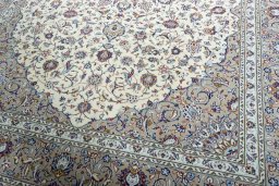 Close-up detail of 2000s Kashan rug from Iran / Persia showing Wool weave