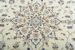 Central medallion detail of 2000s Kashan rug from Iran / Persia