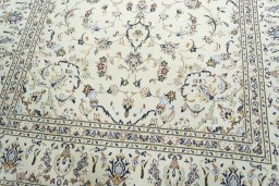 Close-up detail of 2000s Kashan rug from Iran / Persia showing Wool weave