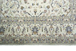 Full view of 2000s Kashan rug from Iran / Persia, 295 × 203 cm in Beige tones