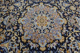 Central medallion detail of 2000s Kashan rug from Iran / Persia