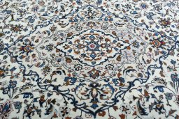 Central medallion detail of 2000s Kashan rug from Iran / Persia