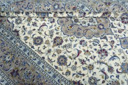 Close-up detail of 2000s Kashan rug from Iran / Persia showing Wool weave