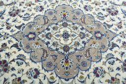 Central medallion detail of 2000s Kashan rug from Iran / Persia