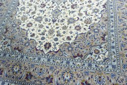 Close-up detail of 2000s Kashan rug from Iran / Persia showing Wool weave