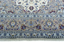 Full view of 2000s Kashan rug from Iran / Persia, 345 × 242 cm in Beige tones