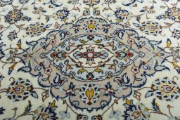 Central medallion detail of 2000s Kashan rug from Iran / Persia
