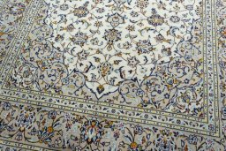Close-up detail of 2000s Kashan rug from Iran / Persia showing Wool weave