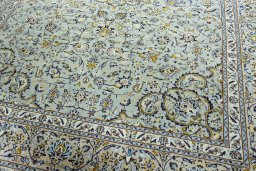 Close-up detail of 2000s Kashan rug from Iran / Persia showing Wool weave