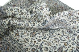Surface texture of 2000s Kashan rug with natural Wool and intricate pattern