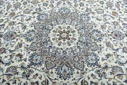 Central medallion detail of 2000s Kashan rug from Iran / Persia
