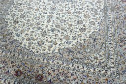 Close-up detail of 2000s Kashan rug from Iran / Persia showing Wool weave
