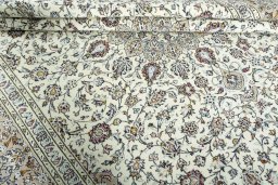 Close-up detail of 2000s Kashan rug from Iran / Persia showing Wool weave