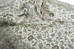 Surface texture of 2000s Kashan rug with natural Wool and intricate pattern