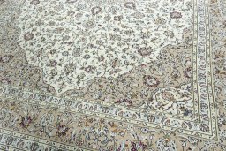 Close-up detail of 2000s Kashan rug from Iran / Persia showing Wool weave