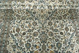 Close-up detail of 2000s Kashan rug from Iran / Persia showing Wool weave