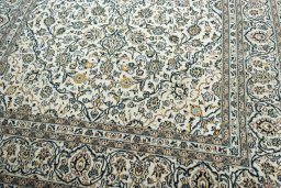 Close-up detail of 2000s Kashan rug from Iran / Persia showing Wool weave