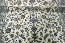 Close-up detail of 2000s Kashan rug from Iran / Persia showing Wool weave