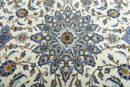 Central medallion detail of 2000s Kashan rug from Iran / Persia
