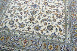 Close-up detail of 2000s Kashan rug from Iran / Persia showing Wool weave