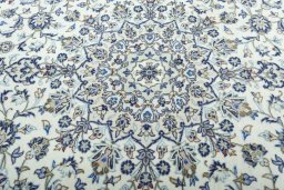 Central medallion detail of 2000s Kashan rug from Iran / Persia