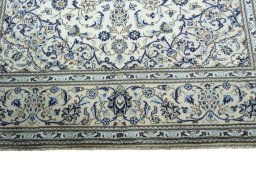 Full view of 2000s Kashan rug from Iran / Persia, 303 × 202 cm in Beige tones