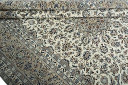 Close-up detail of 2000s Kashan rug from Iran / Persia showing Wool weave