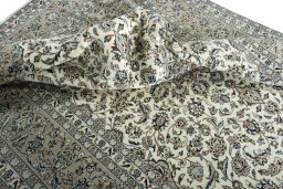 Surface texture of 2000s Kashan rug with natural Wool and intricate pattern