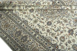 Close-up detail of 2000s Kashan rug from Iran / Persia showing Wool weave