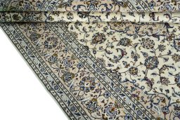 Close-up detail of 2000s Kashan rug from Iran / Persia showing Wool weave