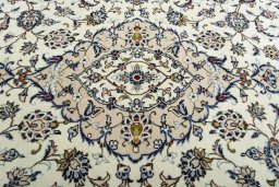 Central medallion detail of 2000s Kashan rug from Iran / Persia