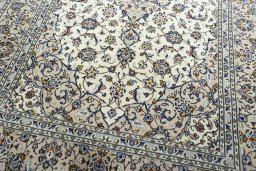Close-up detail of 2000s Kashan rug from Iran / Persia showing Wool weave