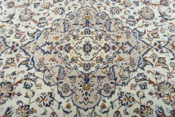 Central medallion detail of 2000s Kashan rug from Iran / Persia