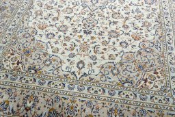 Close-up detail of 2000s Kashan rug from Iran / Persia showing Wool weave
