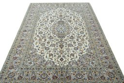Surface texture of 2000s Kashan rug with natural Wool and intricate pattern