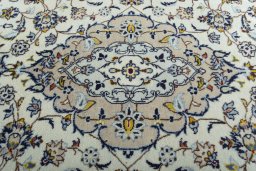 Central medallion detail of 2000s Kashan rug from Iran / Persia