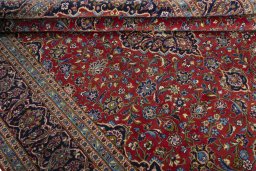 Close-up detail of 2000s Kashan rug from Iran / Persia showing Cork weave