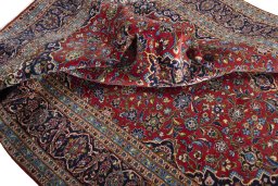 Surface texture of 2000s Kashan rug with natural Cork and intricate pattern