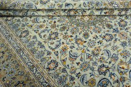 Close-up detail of 2000s Kashan rug from Iran / Persia showing Wool weave