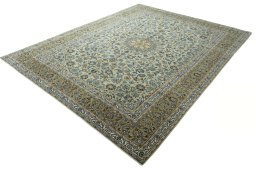 Corner detail of 2000s Kashan rug showing border pattern and Wool pile