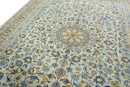 Backside of handmade 2000s Kashan rug showing knot structure and weave density