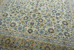 Close-up detail of 2000s Kashan rug from Iran / Persia showing Wool weave