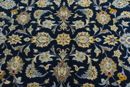 Central medallion detail of 2000s Kashan rug from Iran / Persia