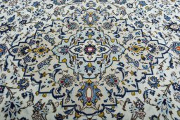 Central medallion detail of 2000s Kashan rug from Iran / Persia